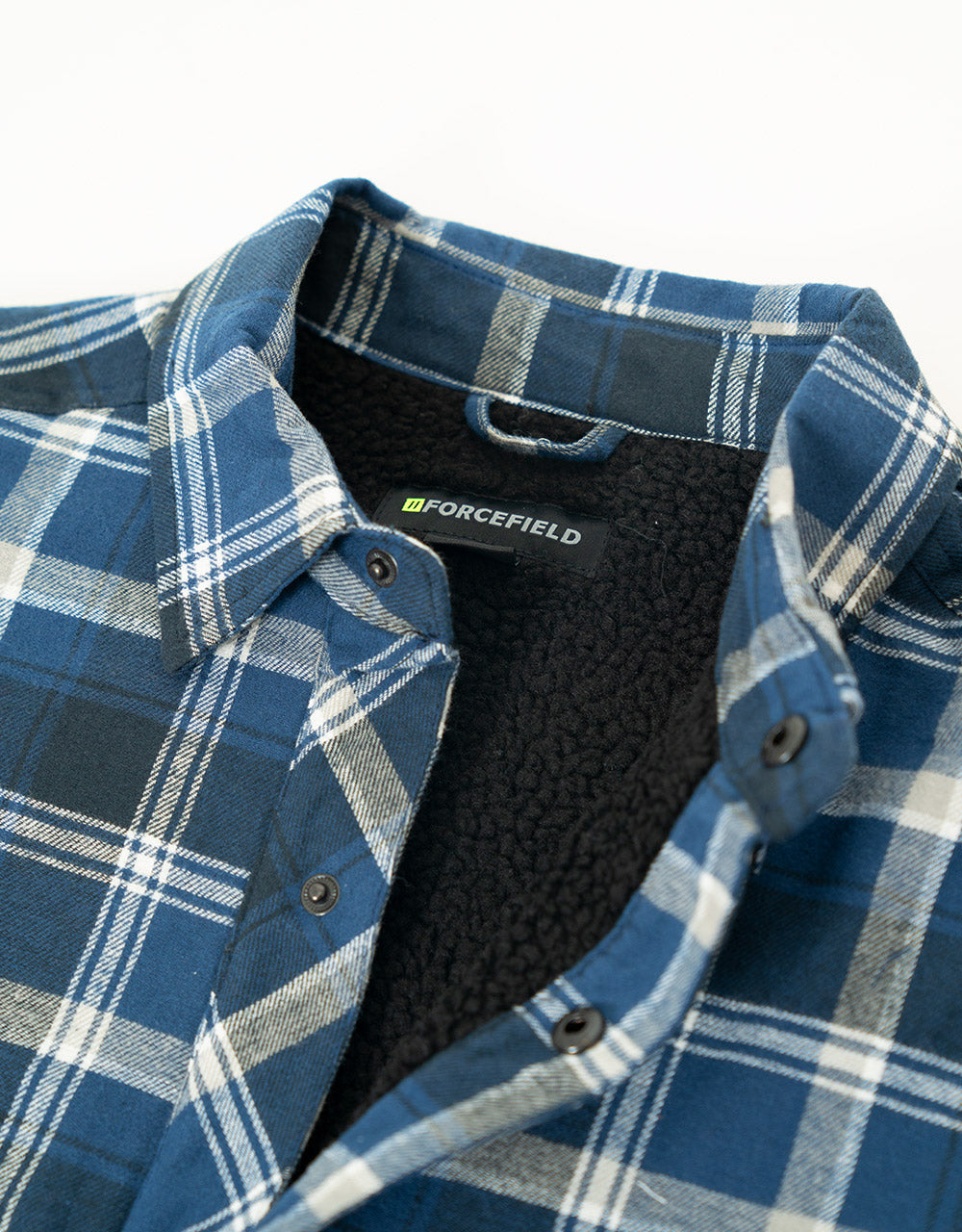Veste chemise bleue en flanelle doublée de sherpa à carreaux